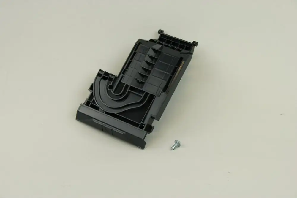 Bosch Anschlussbox-Abdeckung in Schwarz, mit strukturiertem Design und einer Schraube daneben, auf hellem Hintergrund platziert.